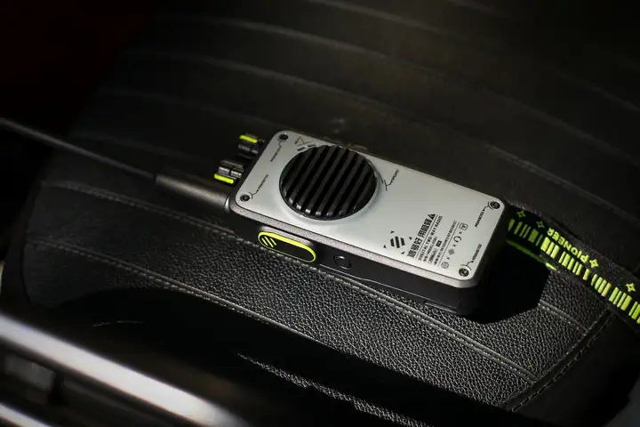 A walkie-talky in a car seat